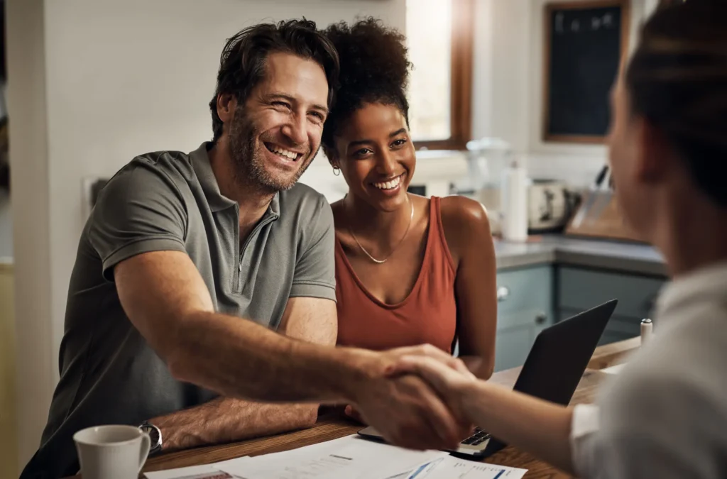 couple with financial advisor flint mi